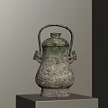 Ancient Style Bronze Ornamental Piece With Carved Patterns Handle And Lid On Display Stand
