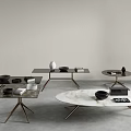 Modern Coffee Tables With Marble Tops And Metal Legs Featuring Decorative Items And Books