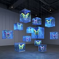 Transparent Cubes With Colorful Butterfly Patterns Hanging In Gallery Exhibition Space