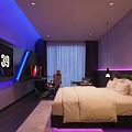 Modern Hotel Guest Room With King Bed Flat Screen TV Work Desk And Ambient Lighting