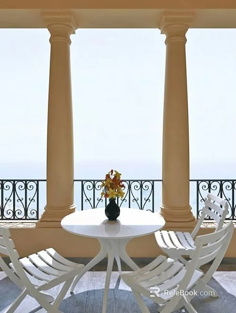 White Round Table And Chairs On Balcony With Sea View And Wrought Iron Railing 3d model 
