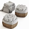 Soft Gray Towels Rolled in Woven Baskets for Bathroom Storage and Decor