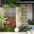 Intricate Decorative Feature Wall In Garden Landscape With Carved Patterns And Surrounding Green Plants
