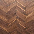 Herringbone Pattern Hardwood Floor With Natural Wood Grain And Rich Brown Tone