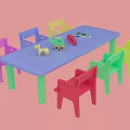 Colorful Kids Table and Chairs Set with Blue Table Various Colored Chairs and Toys on Top