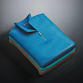 Neatly Folded Blue Polo Shirt With Collar And Zipper On Dark Background