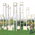 Outdoor Art Installation With Vertical Square Structures Person Grass Purple Flowers Trees Evening Sky