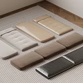 Long Floor Cushions In Assorted Colors On Striped Rug With Wooden Floor