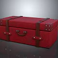 Classic Red Vintage Trunk With Brown Leather Straps And Metal Studs