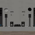 Various Types of Audio Speakers Arranged on White Shelf with Light Wall Background