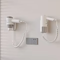 White Wall Mounted Gray And White Hair Dryers With Coiled Cords Near Socket And Blinds