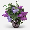 Transparent Vase With Purple And White Lilac Flowers And Green Leaves