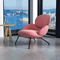 Modern Pink Armchair With Wooden Side Table By Large Window And City Sea View