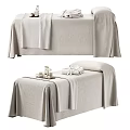 Comfortable Massage Bed With Soft Linen Cover Spa Towel And Essential Oil Bottles