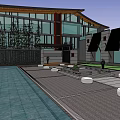 Modern Office Building With Glass Curtain Walls And Outdoor Plaza Seating Areas