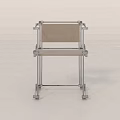 Modern Minimalist Single Chair With Silver Metal Frame And Light Colored Seat