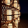 Garden Landscape With Illuminated Lantern Sphere Support Structure And Robed Figure On Sandy Night Ground