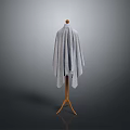Wooden Coat Rack With Gray Knitted Shawl On Simple Dark Background