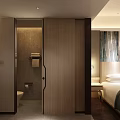 Hotel Room Interior With Comfortable Bed Sofa Desk And Modern Decor