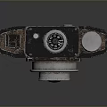 Vintage Camilla 2 Camera Electronic Device With Retro Design Black Body And Silver Lens