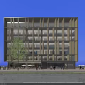 Modern Multi Story Hotel Building With Glass Facade In Urban Setting With Pedestrians And Cars