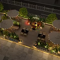 Outdoor Restaurant Terrace With Wooden Deck Green Plants Umbrellas Seating And Ambient Lighting