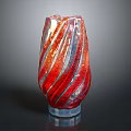 Colorful Glass Vase With Red Orange Blue Stripes And Glossy Surface On Dark Background