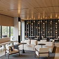 Elegant Sales Office Interior Design With Wooden Ceiling Large Windows Sofas Chairs And Coffee Tables