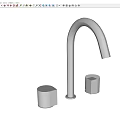 Modern Stainless Steel Faucet With Two Handles On Contemporary Sink Counter