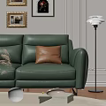 Modern Green Leather Three-Seater Sofa With Wall Decorative Paintings Floor Lamp And Palm Plant