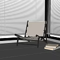 Modern Leisure Chair With Black Frame Light Colored Seat And White Blinds Near Books