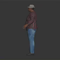 Man in Striped Shirt and Blue Jeans Standing Against Gray Background