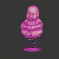 Little Monk Statue In Yellow Robe Sitting Cross Legged On Spring Base