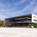 Modern School Buildings With Green Roofs And Varied Architectural Designs In Landscaped Campus