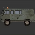 Old Green Vintage Van With Orange Warning Lights On Roof And Rusty Exterior