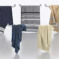 Textured Towels Dark Blue Gray and Beige Hanging on Metal Towel Rack with Striped Patterns