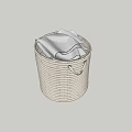 White Towel Peeking Out of a Round White Woven Storage Basket