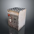 Rusty Old Metal Square Household Appliance With Red Knob And Grid Top Surface