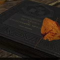Vintage Book With Intricate Patterns And Autumn Leaves On Wooden Table
