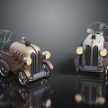 Vintage Toy Cars With Propellers Headlights Metallic Brown Beige Bodies And Reflective Surfaces