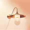 Modern Metal Wall Sconce With Curved Arm And Glass Shade For Warm Lighting