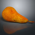 Fresh Ripe Orange And Yellow Pear With Speckled Skin On Dark Background