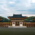 Ancient Wooden Architecture With Black Overhanging Eaves Green Grassland And Trees Under Cloudy Sky