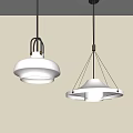 Two Modern White Pendant Lights with Minimalist Design Hanging Against Grey Wall