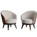 Elegant Single Armchairs With Curved Backrest Light Upholstery Dark Armrests And Wooden Legs