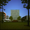 Modern Tall School Building With Green Roof Surrounded By Trees And Grass Field