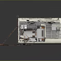 White Rectangular Computer Cooling Component With Circular Fan Grille And Metal Brackets