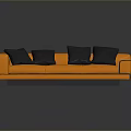 Modern Orange Sofa With Four Black Cushions And Small Square Gray Ottoman