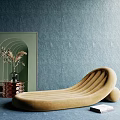 Curved Beige Lounge Chair With Brass Side Table Dried Flowers Framed Artwork Gray Wall