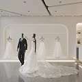 Modern Open Bridal Shop with Hanging Wedding Dresses Bride in Gown Groom in Suit Inside